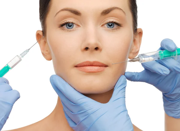 Dermal filler injection along cheekbone